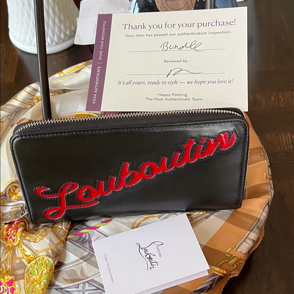 Christian Louboutin Handbags - Christian Louboutin Black Wallet with Red Script